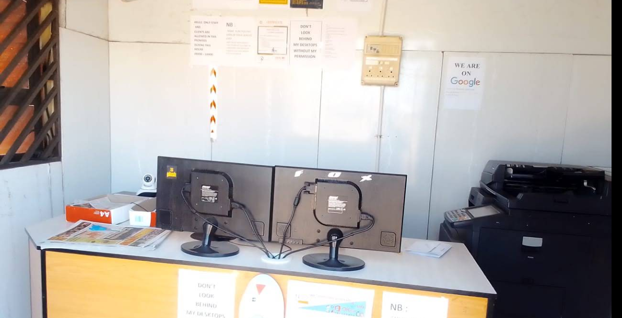 NETPOINT CYBER CAFE counter with computers and printer